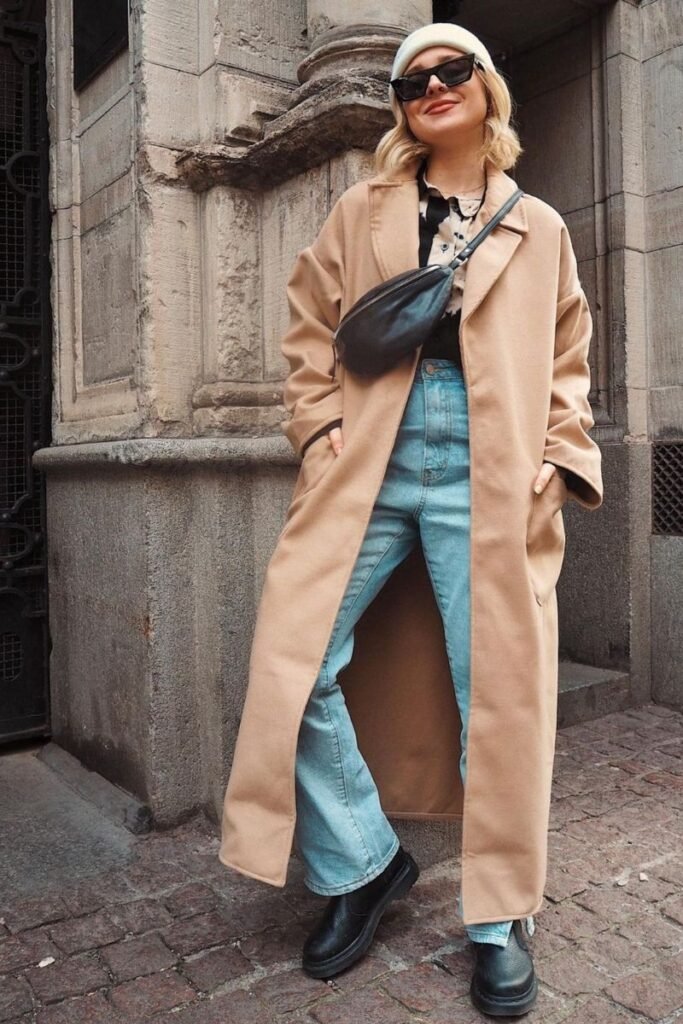 Beige Coat High Waisted Blue Jeans Black Boots Beanie