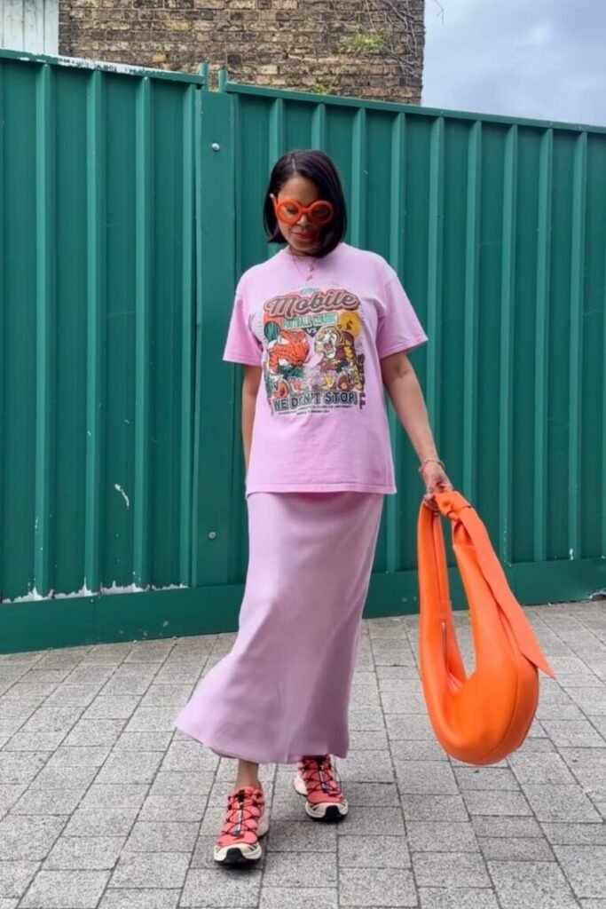 Light Pink Satin Skirt Fun Graphic T Shirt Bright Orange Sneakers