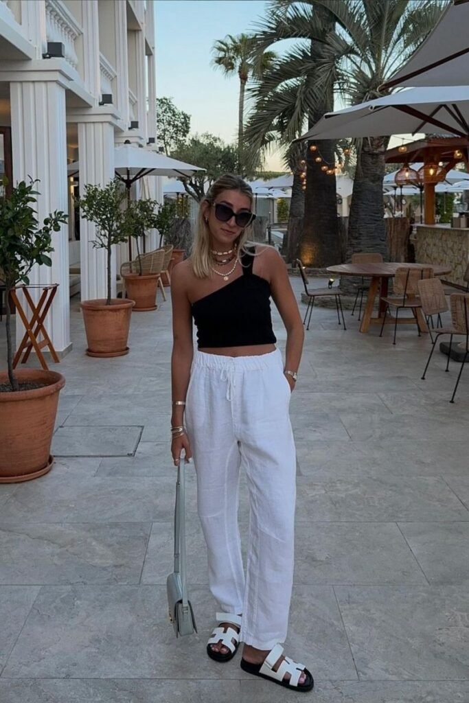 One shoulder Black Top white linen trousers