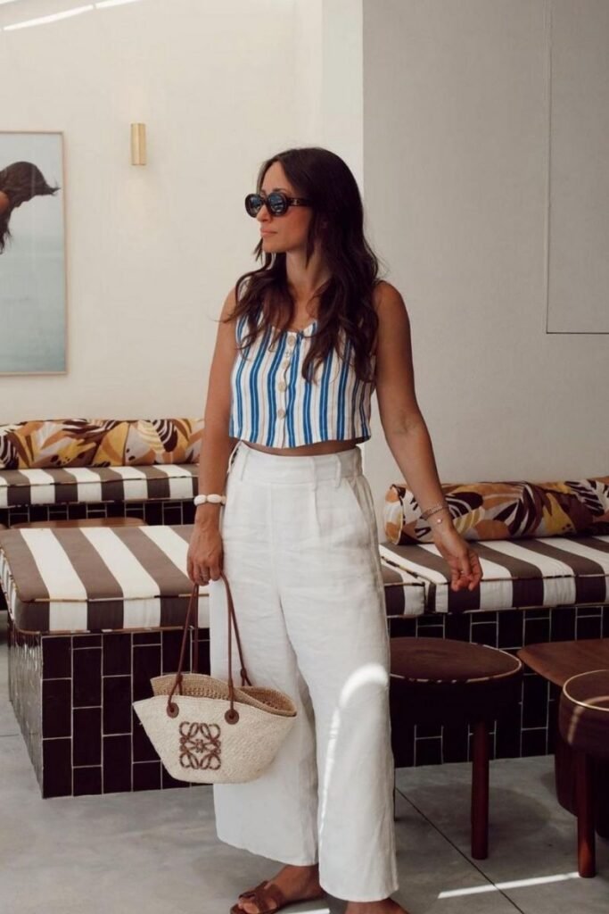 Sleeveless Blue and White Striped Top Wide leg White Trousers